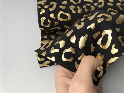 Bomuldsjersey - flot guld leo foil på sort bund